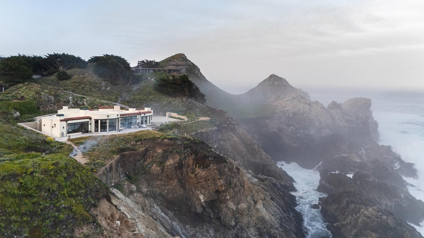 36654 Highway 1 Carmel, CA 93923 - Photo 21 of 23 a view of a house with a mountain
