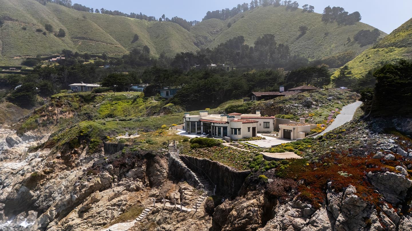 36654 Highway 1 Carmel, CA 93923 - Photo 22 of 23 a view of a houses with a yard