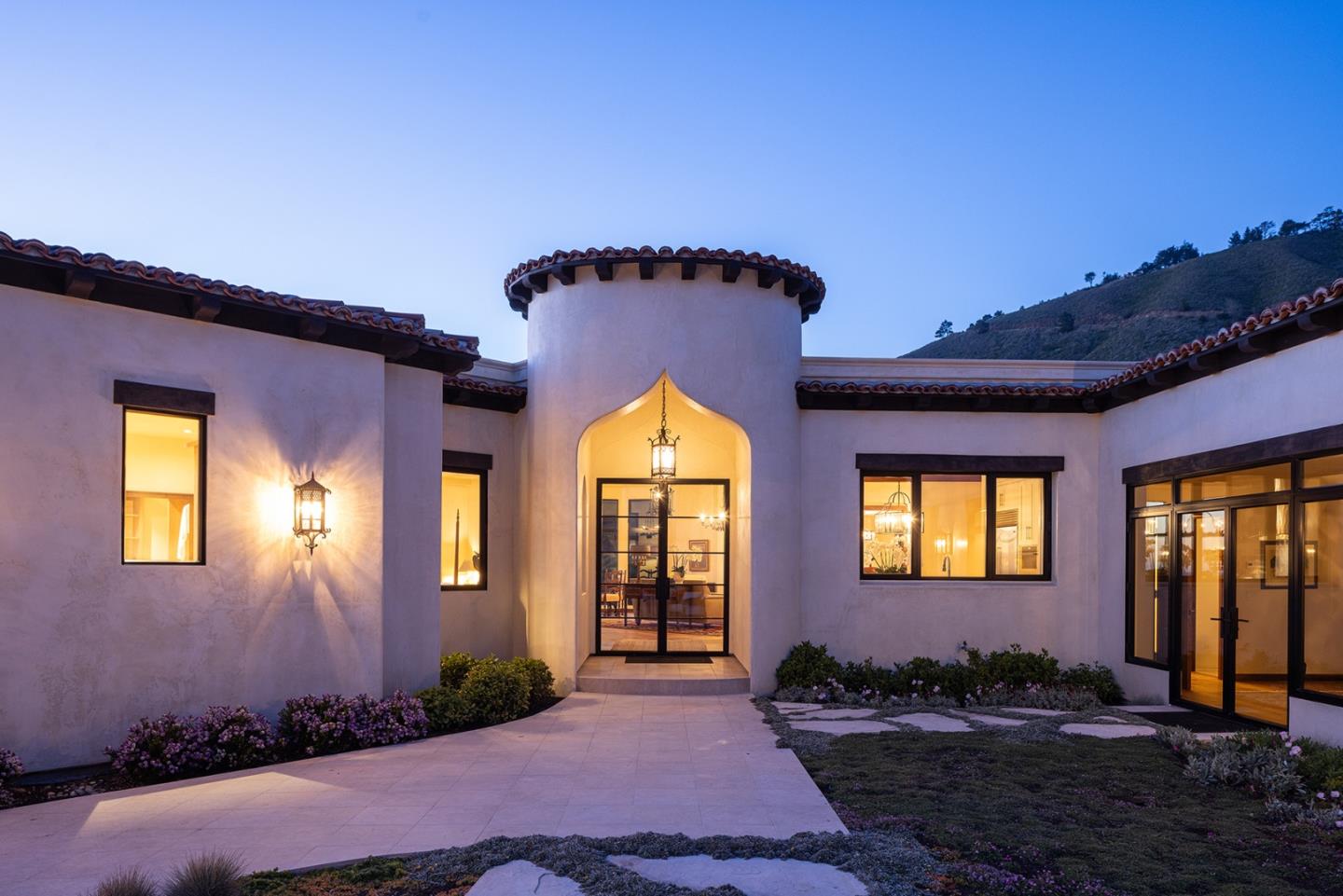 36654 Highway 1 Carmel, CA 93923 - Photo 6 of 23 a front view of a house with a yard