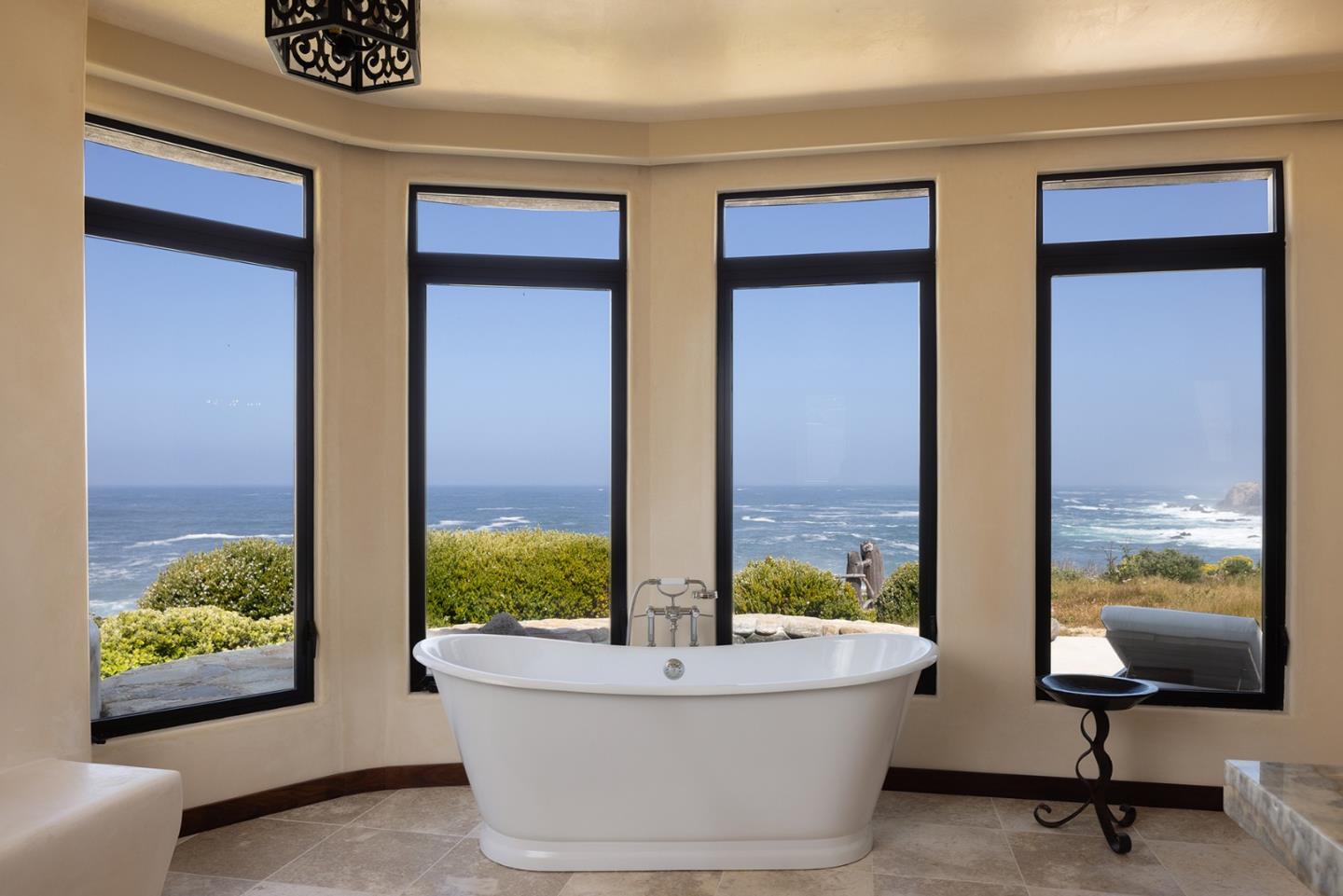 36654 Highway 1 Carmel, CA 93923 - Photo 10 of 23 a view of a bathtub in a room