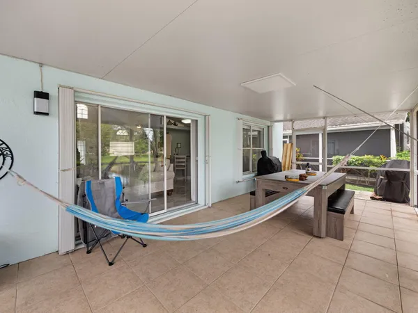 a room with lots of table chair