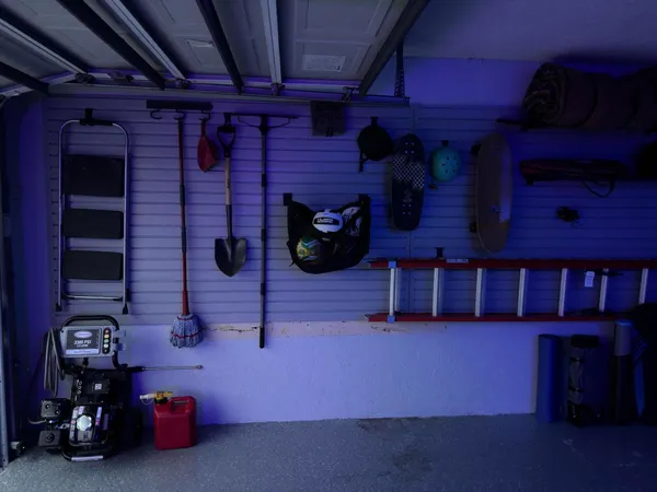an aerial view of a house with outdoor space