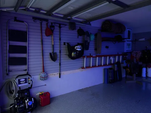 an aerial view of a house with outdoor space