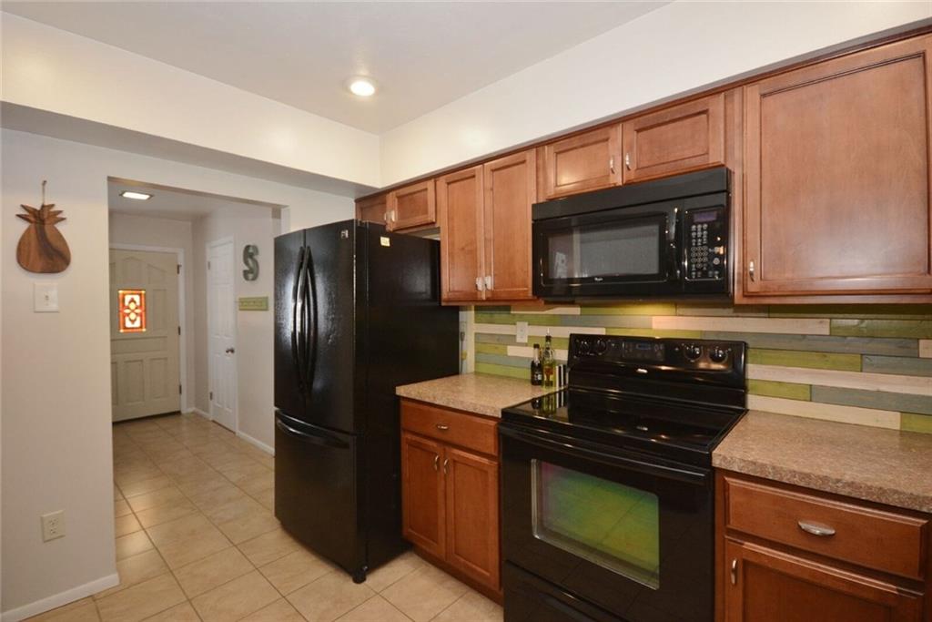 2428 Rose Garden Road Pittsburgh, PA 15220 - Photo 12 of 25 LOTS of cabinets and plenty of counter space!