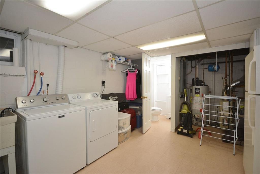2428 Rose Garden Road Pittsburgh, PA 15220 - Photo 22 of 25 Large laundry room houses mechanicals and half bath