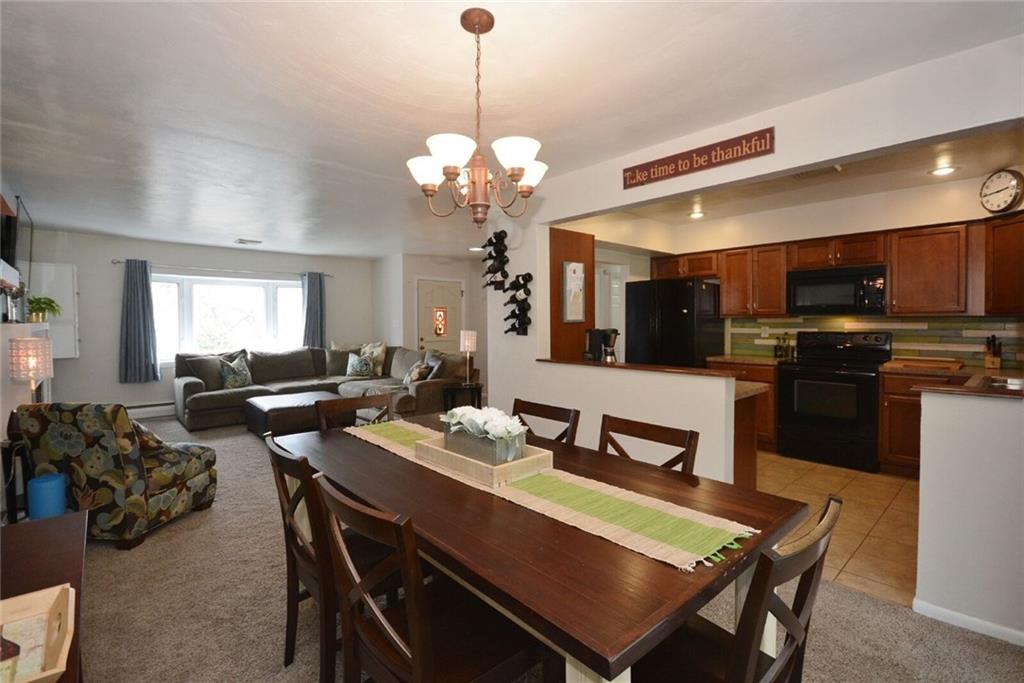 2428 Rose Garden Road Pittsburgh, PA 15220 - Photo 10 of 25 This semi-open concept first floor area is perfect for large family gatherings and dinner parties.