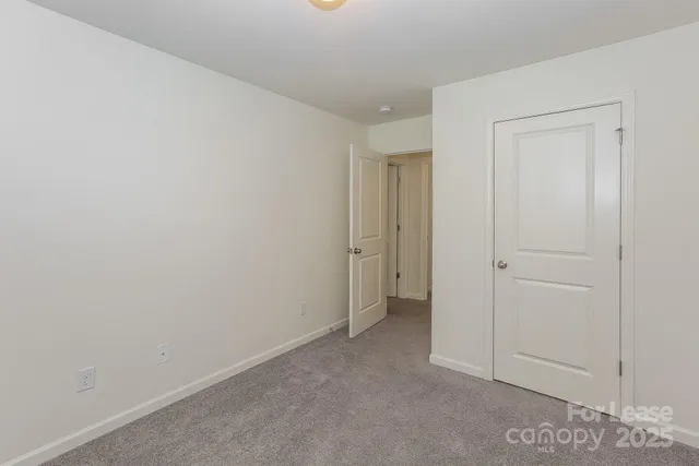 an empty room with a empty space and window