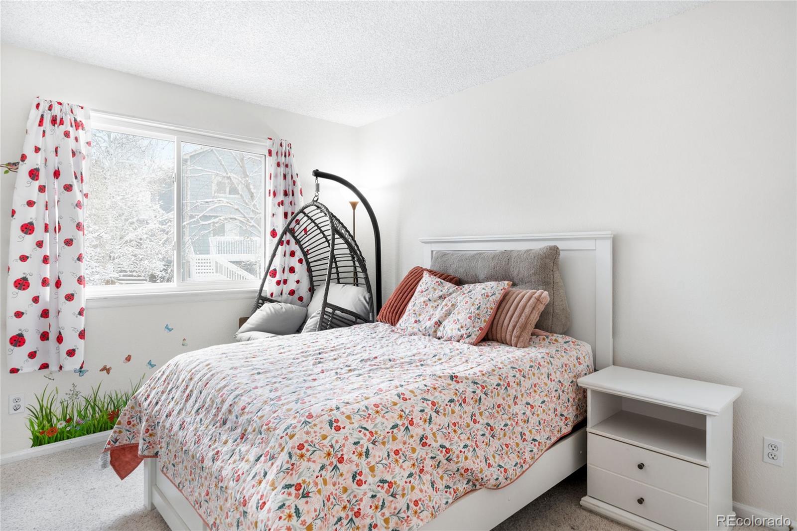 4132 South Jebel Way Aurora, CO 80013 - Photo 23 of 36 a bedroom with a bed and a window
