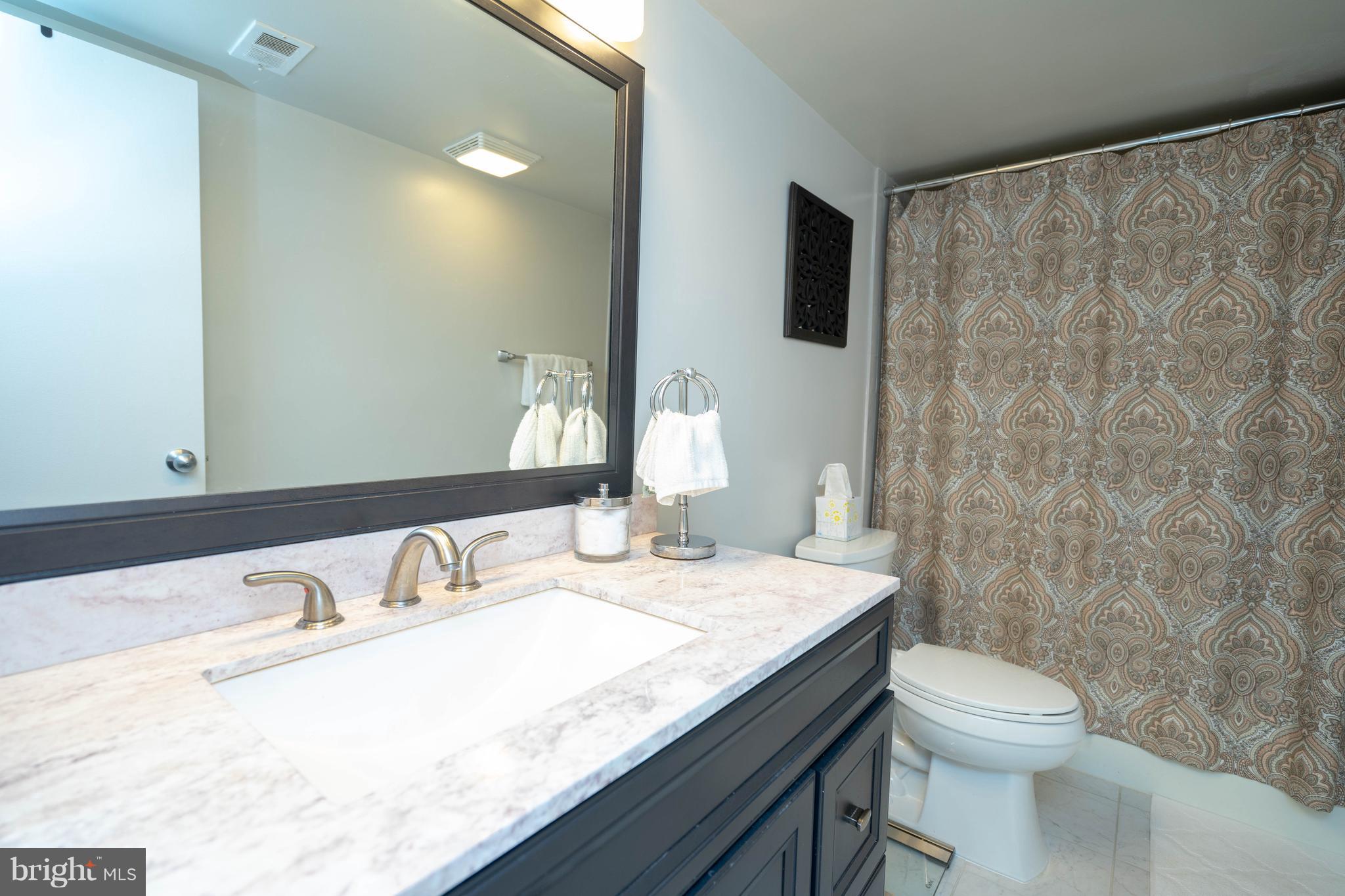 1415 Northgate Square, Unit 12C Reston, VA 20190 - Photo 13 of 15 Hallway Bath
