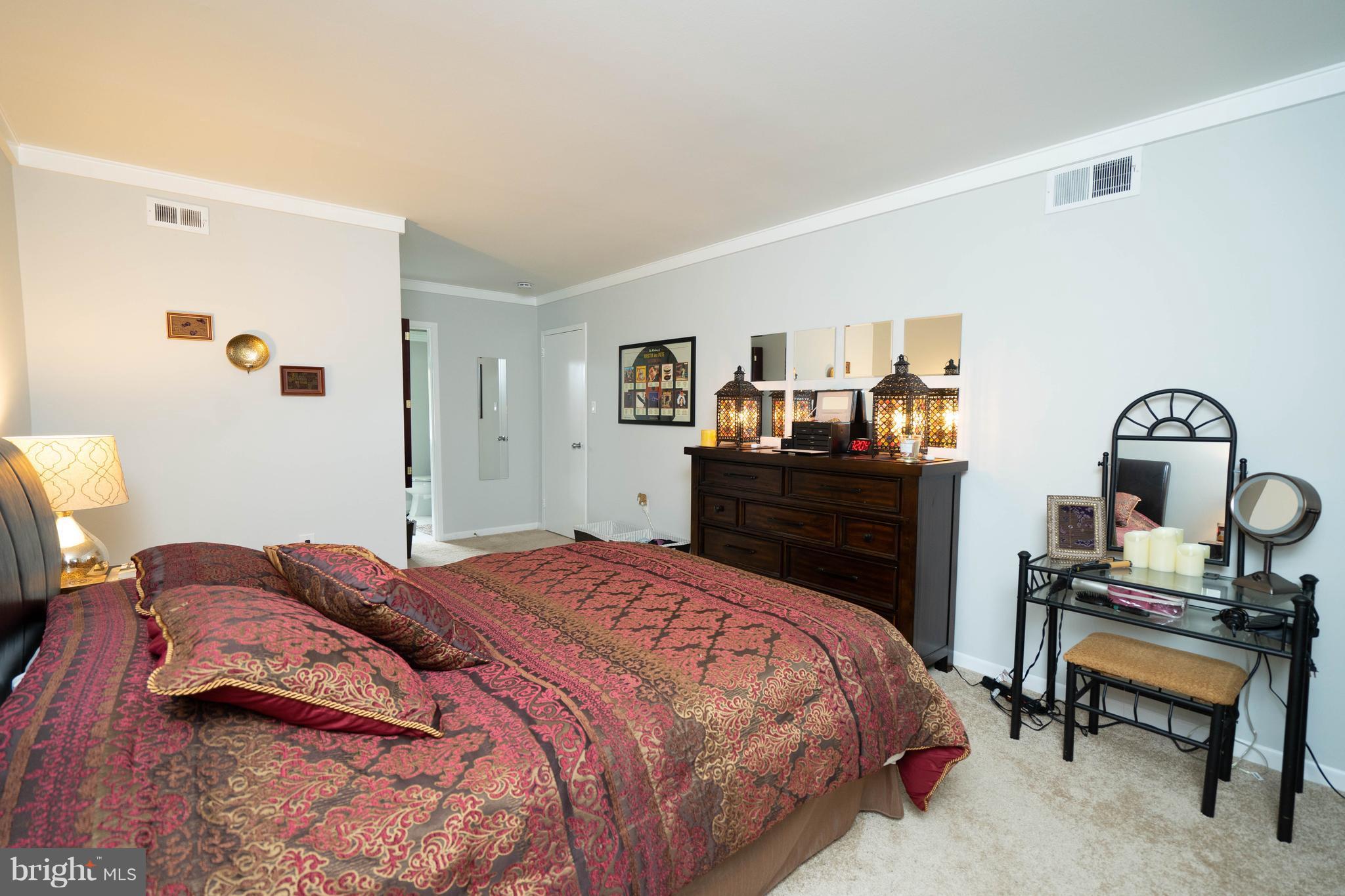 1415 Northgate Square, Unit 12C Reston, VA 20190 - Photo 9 of 15 Master Bedroom w Walk In Closet
