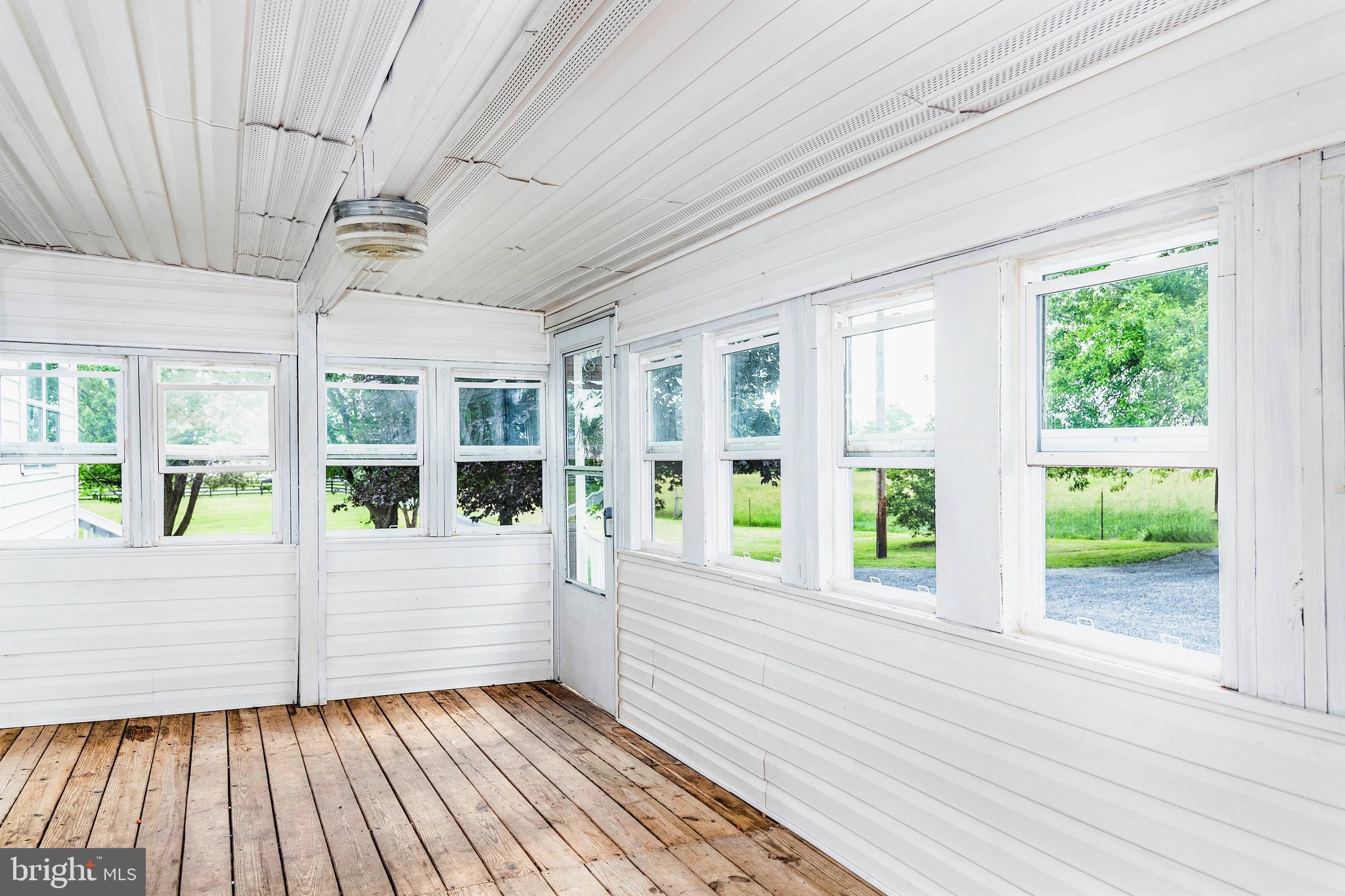833 Nations Spring Road White Post, VA 22663 - Photo 8 of 15 Wonderful enclosed porch for all season use!