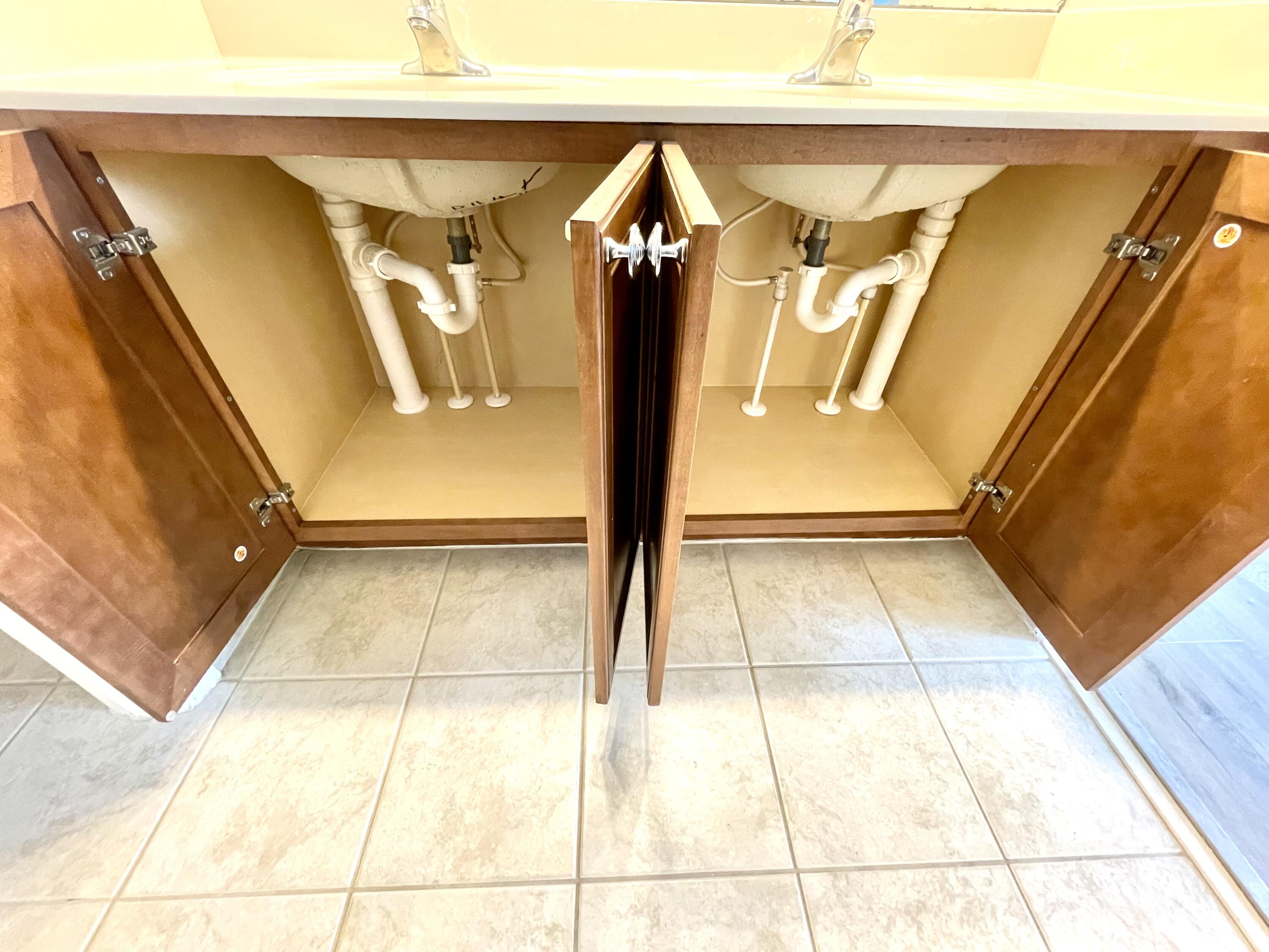 3043 Laurel Ridge Circle Riviera Beach, FL 33404 - Photo 23 of 35 UNDER THE SINK