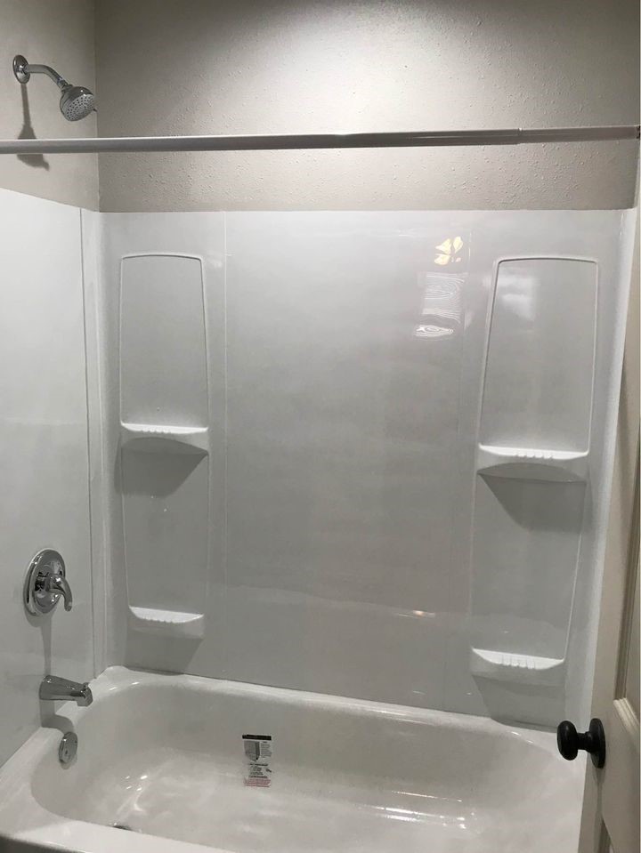 1020 North Main Street, Unit 9 Baytown, TX 77520 - Photo 5 of 8 a bathroom with a shower and a sink