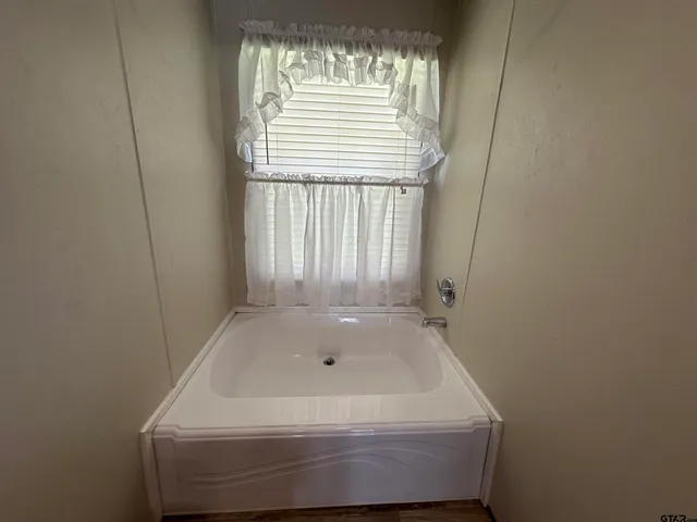 a bathroom with a tub