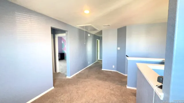 a view of livingroom with hallway