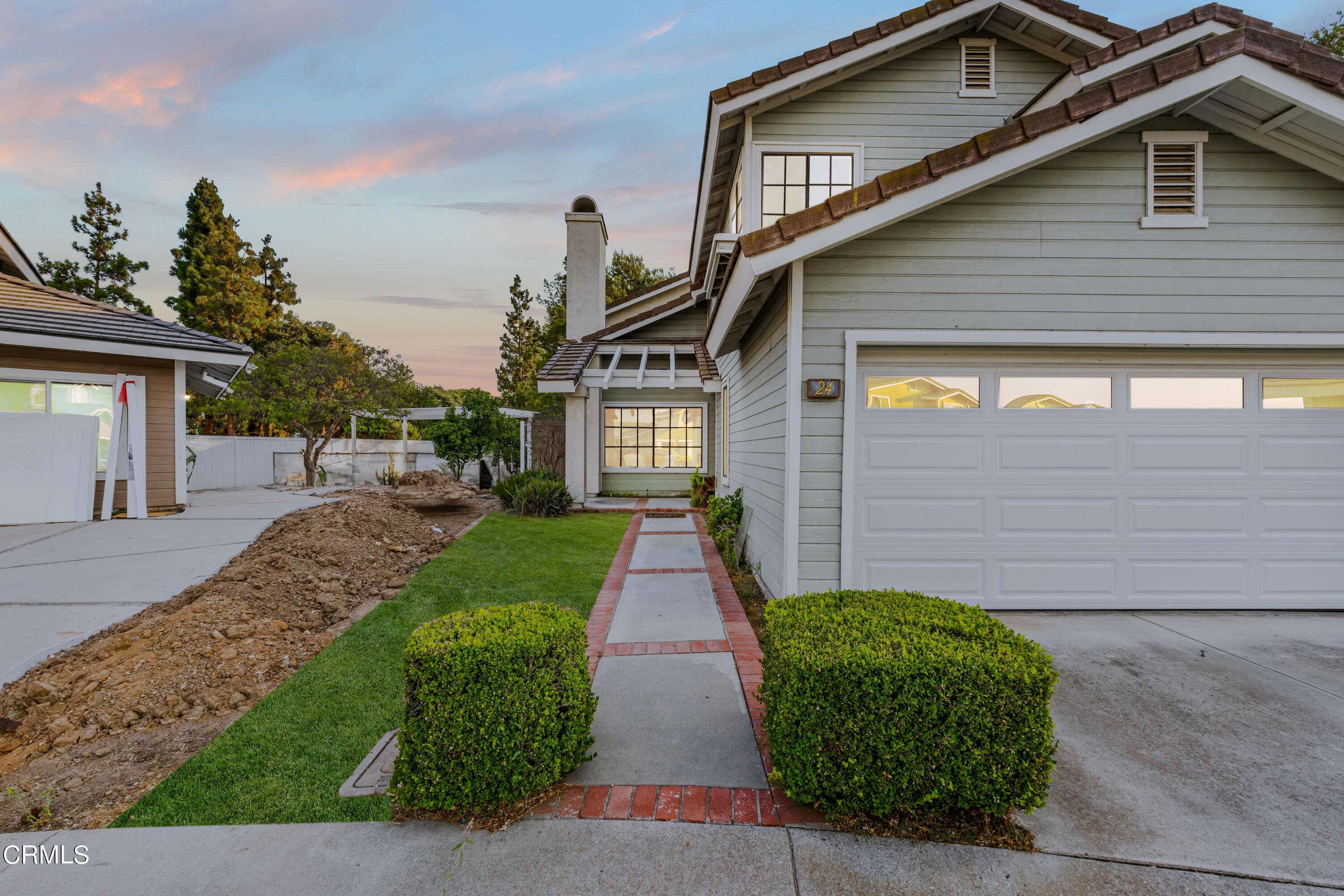 24 Silkberry Irvine, CA 92614 - Photo 2 of 33 a view of a house with a small yard plants and large tree