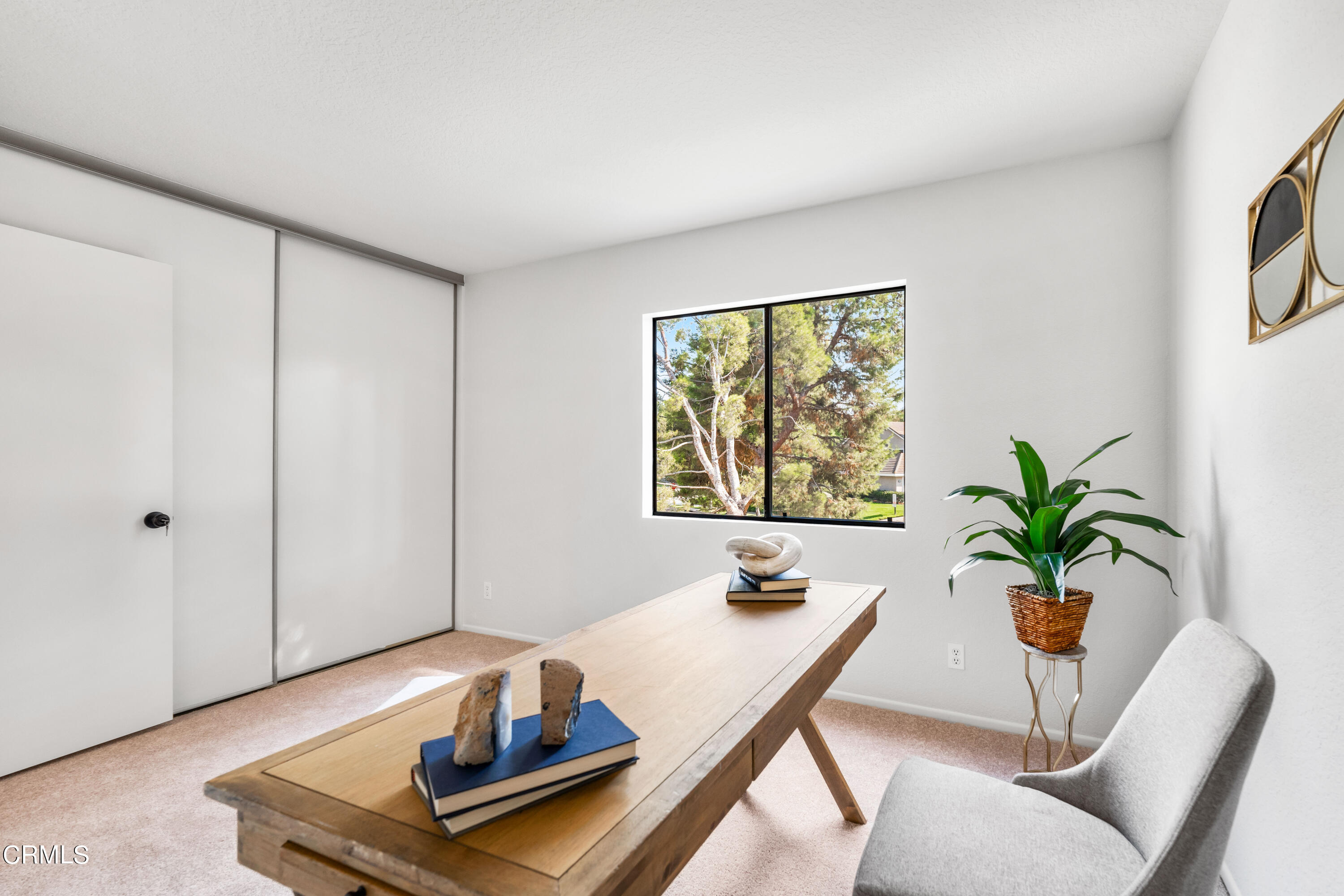 24 Silkberry Irvine, CA 92614 - Photo 21 of 33 a living room with furniture potted plant and a window