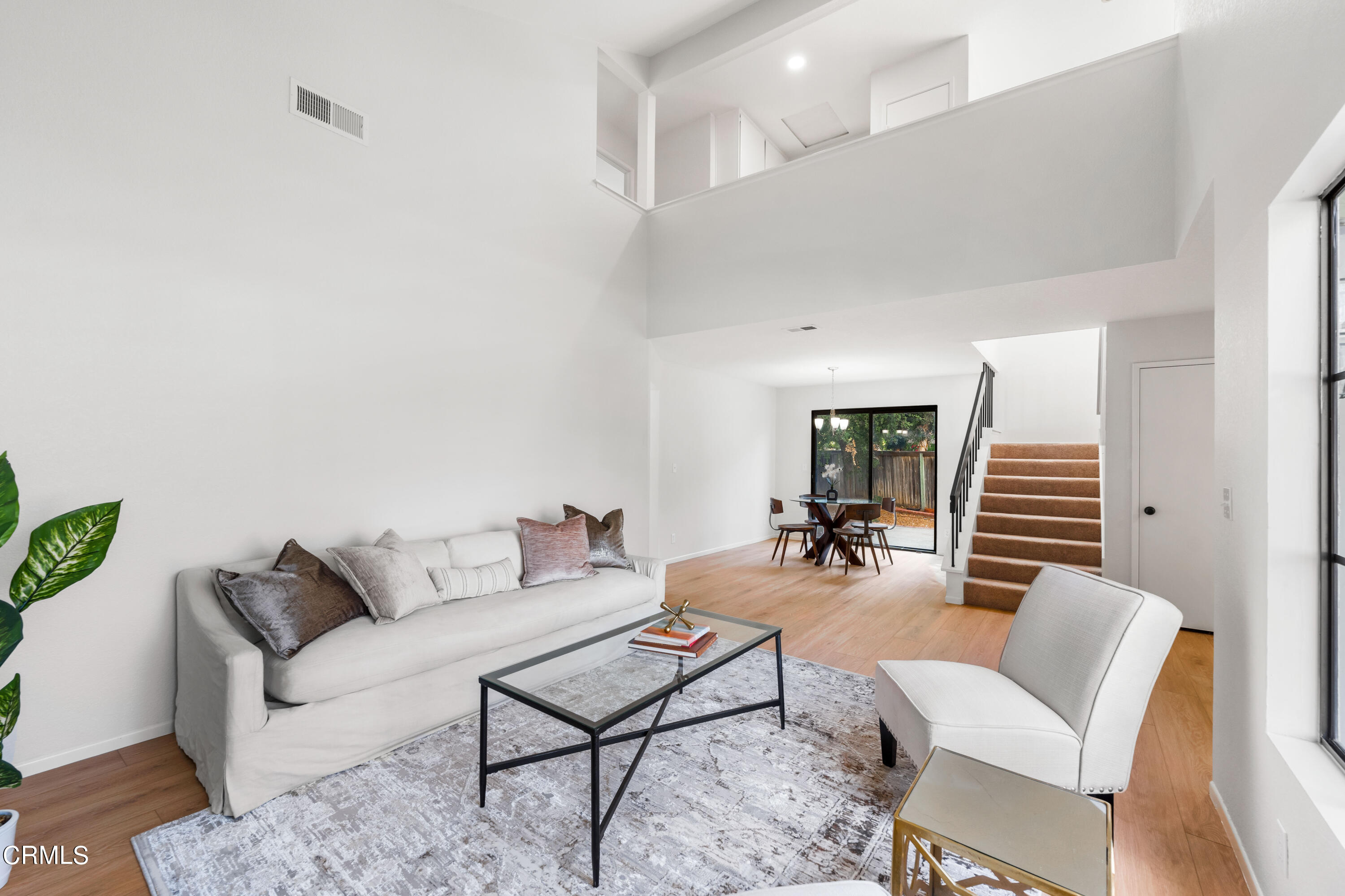 24 Silkberry Irvine, CA 92614 - Photo 4 of 33 a living room with furniture and wooden floor