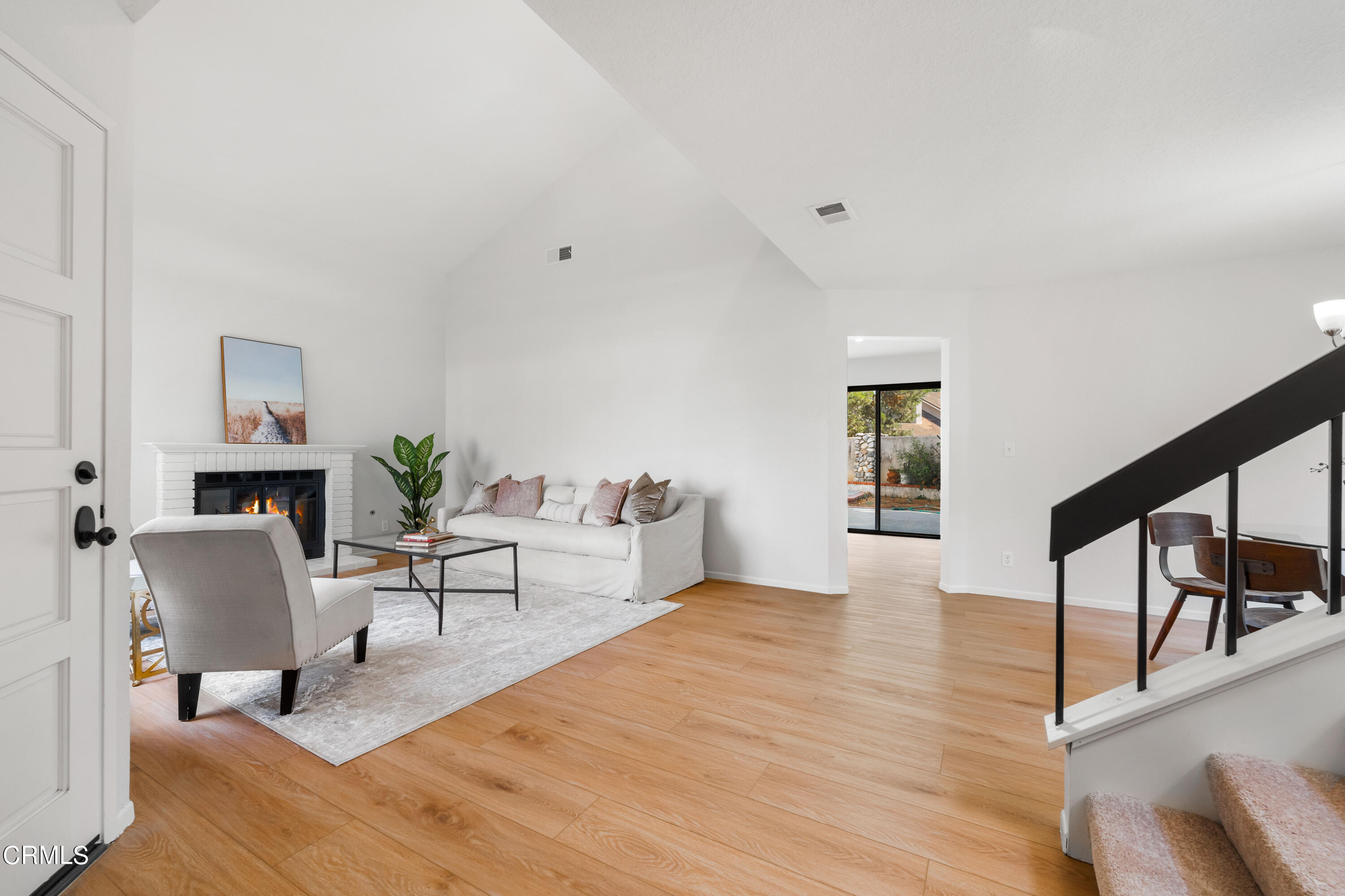 24 Silkberry Irvine, CA 92614 - Photo 6 of 33 a living room with furniture and a wooden floor