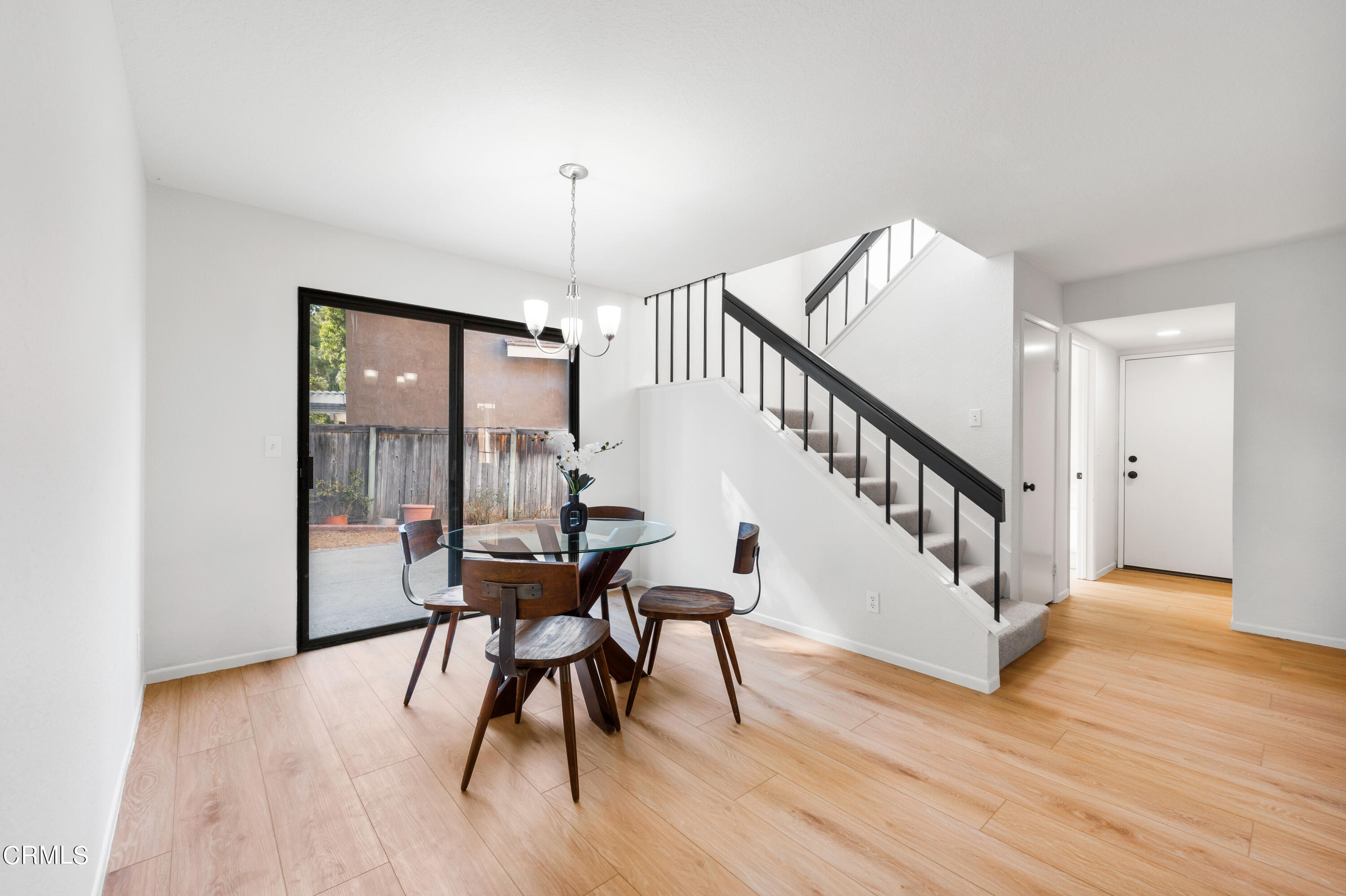 24 Silkberry Irvine, CA 92614 - Photo 7 of 33 a view of a room with wooden floor table and chairs