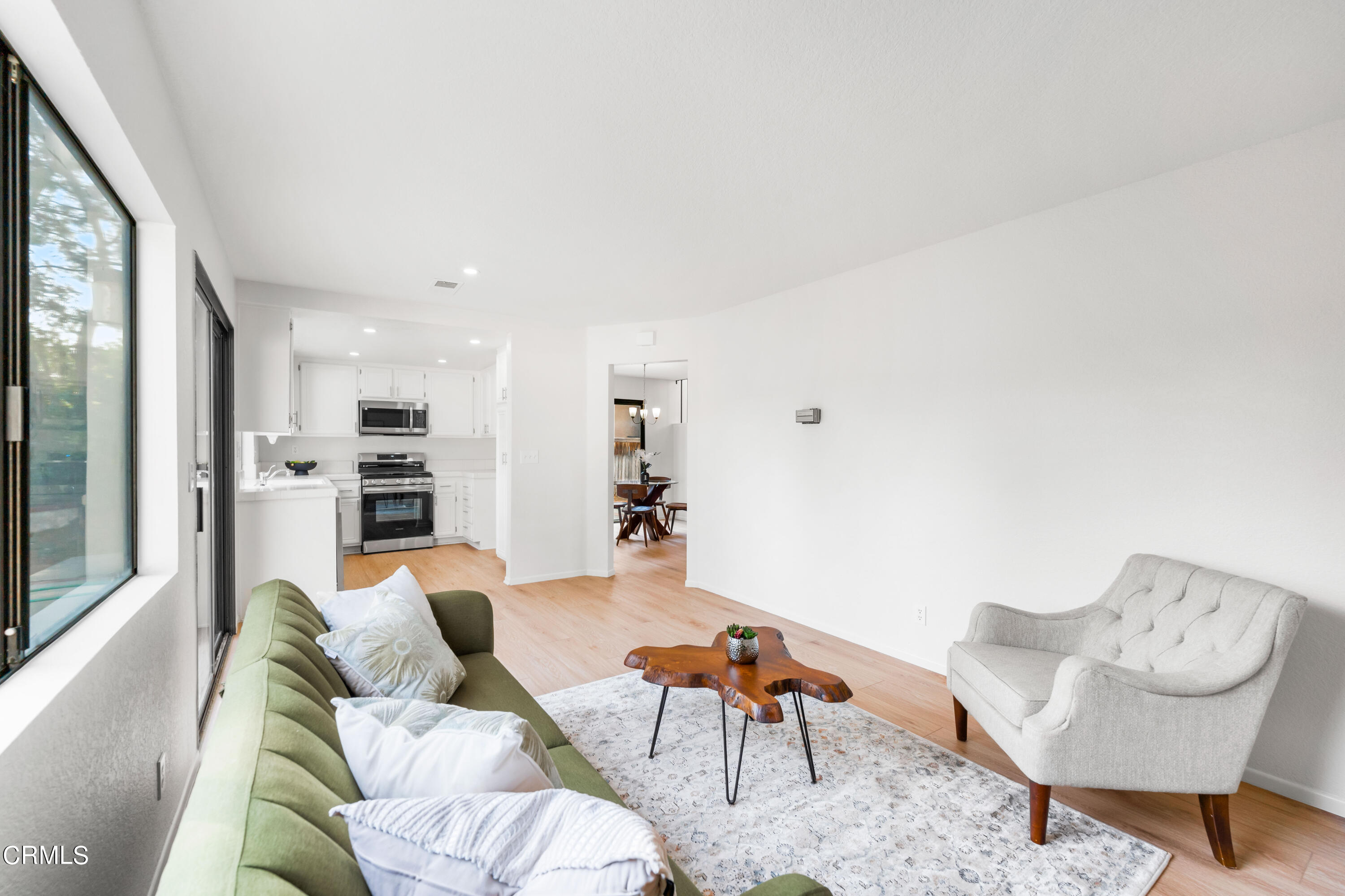 24 Silkberry Irvine, CA 92614 - Photo 10 of 33 a living room with furniture and a large window