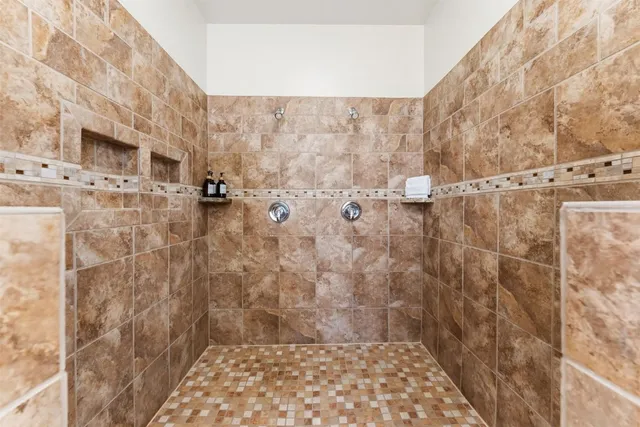 a room with furniture and pool table
