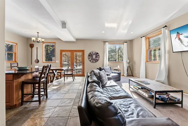 a bedroom with furniture and wooden floor