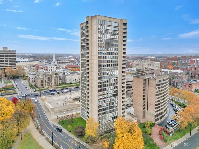 a view of a city with tall buildings
