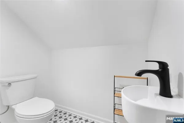 a bathroom with a sink and a toilet