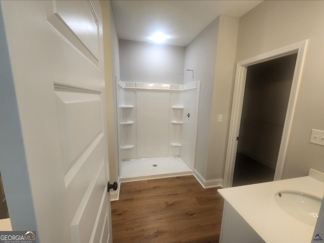 102 Silver Maple Court Byron, GA 31008 - Photo 15 of 17 a bathroom with a sink and shower
