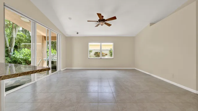 a view of a kitchen with furniture and a window
