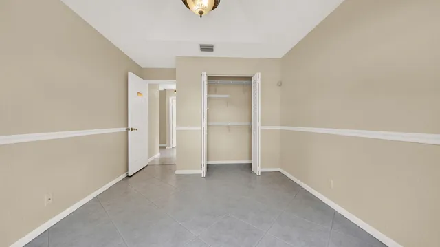 a view of a garden with a bench in a garden