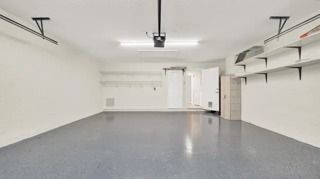 a view of a dinning table and chairs in the front of house