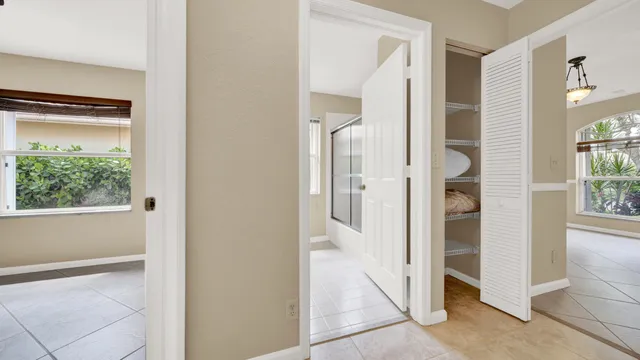 a view of a house with backyard and porch