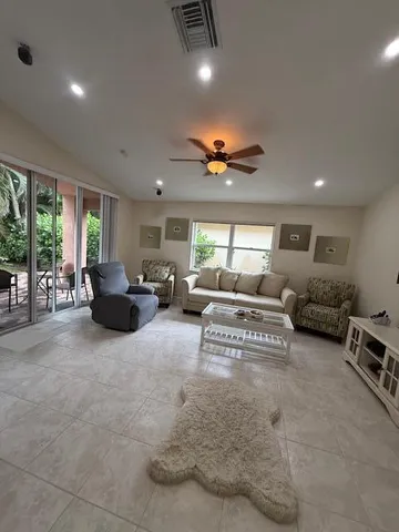 an aerial view of residential houses with outdoor space and street view