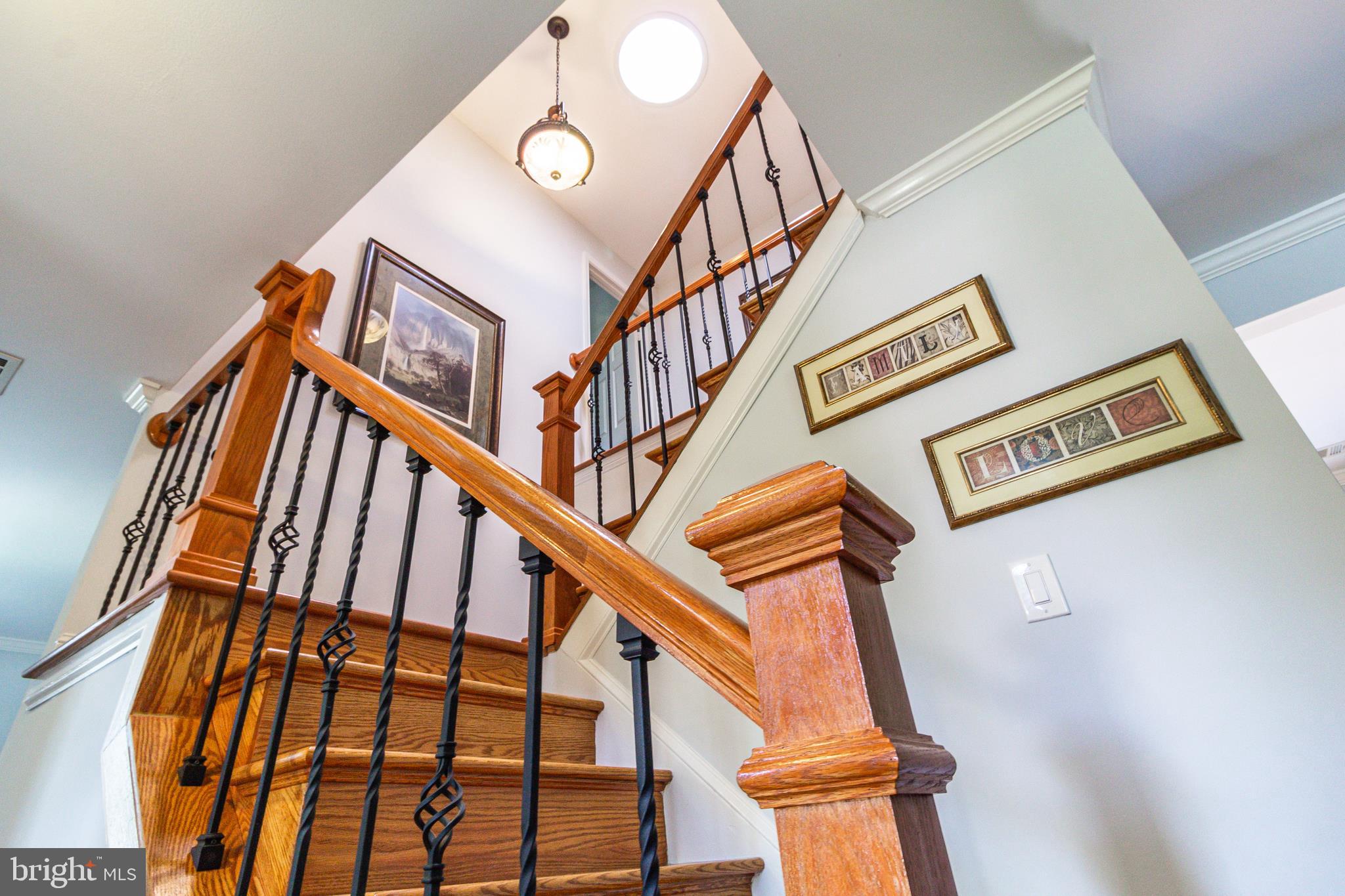 159 Choptank Road Stafford, VA 22556 - Photo 6 of 42 Wood floor stairway/ skylight