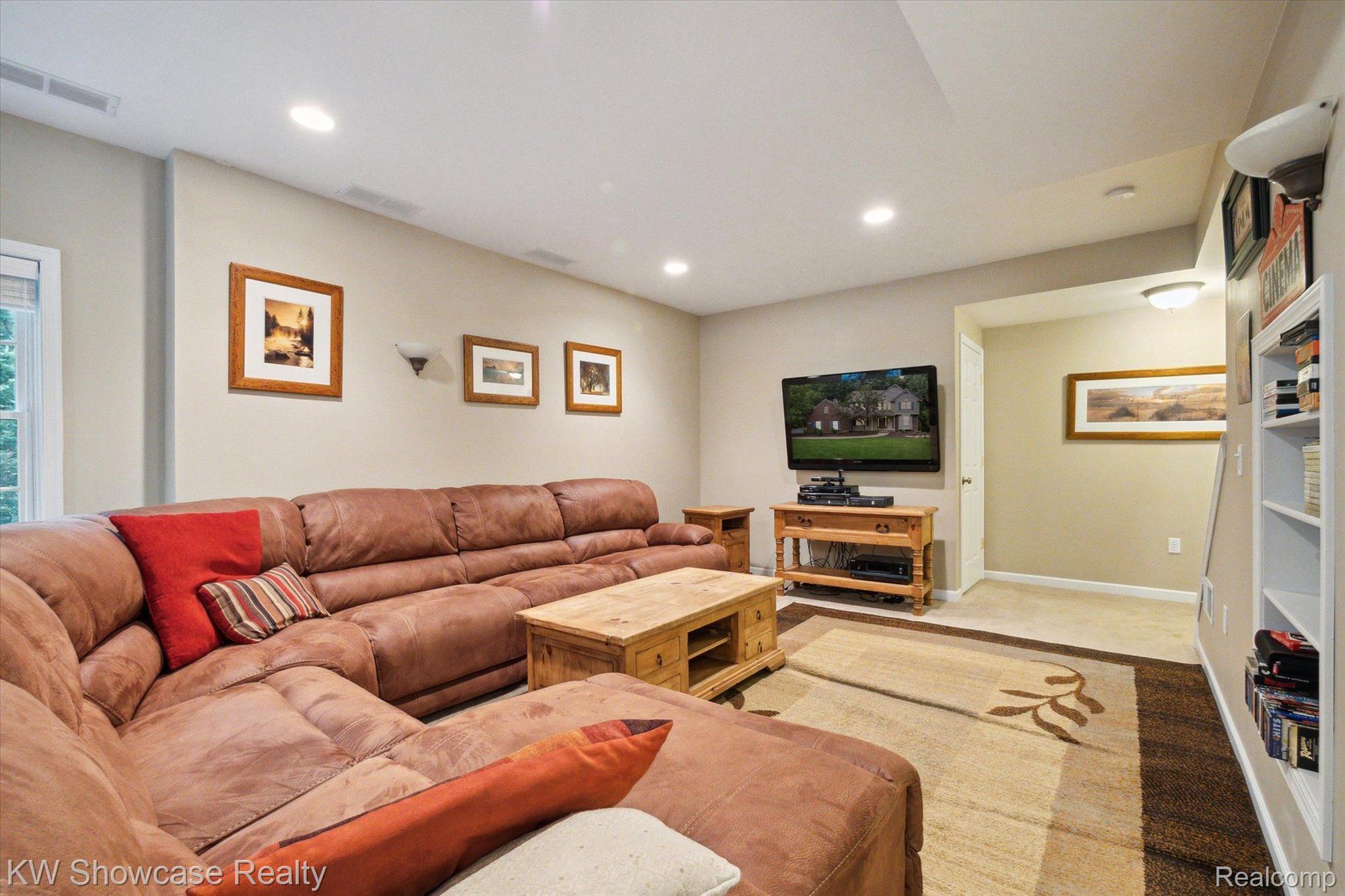 564 Timber Ridge Drive Highland, MI 48357 - Photo 24 of 40 Great lighting throughout the lower level.