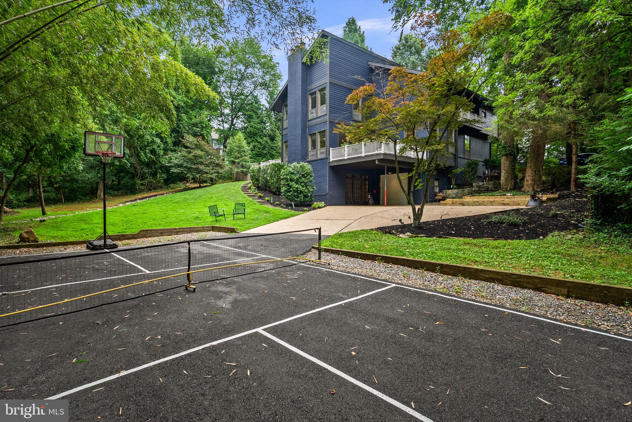 8025 Riverside Drive Cabin John, MD 20818 - Photo 55 of 75 Rear Exterior / Pickleball & Basketball
