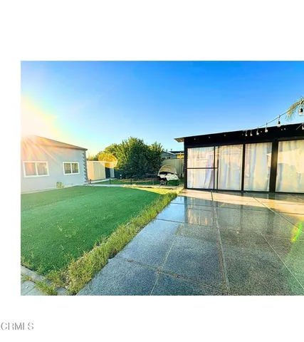 a black and white photo of a big room