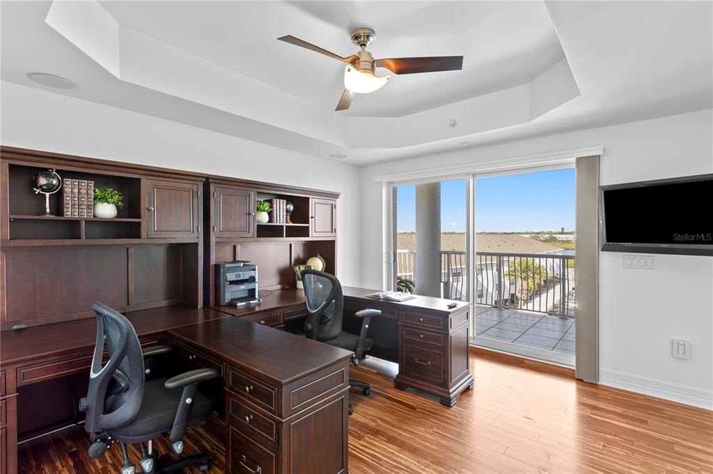 19730 Gulf Boulevard, Unit 400 Indian Rocks Beach, FL 33785 - Photo 63 of 90 a view of a workspace with furniture and a livingroom