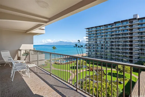 a view of balcony with furniture
