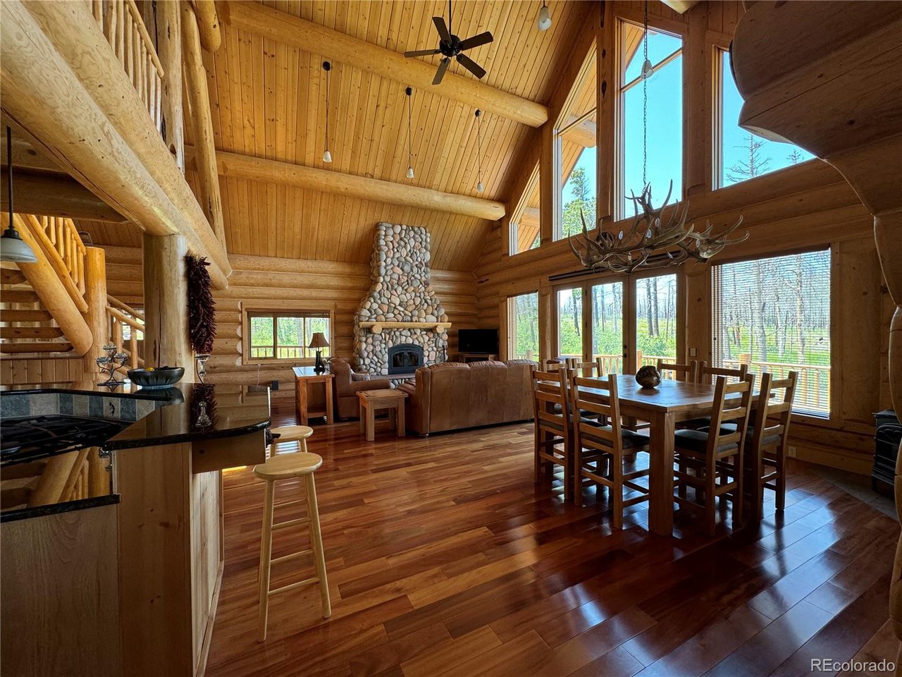 2255 Port Loop Fort Garland, CO 81133 - Photo 39 of 42 a view of a dining room with furniture window and wooden floor