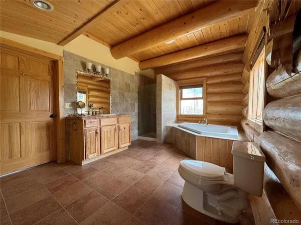 a kitchen with a sink and wooden cabinets