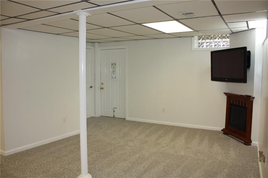 81 Bellview Circle McKees Rocks, PA 15136 - Photo 20 of 24 Another angle of Gameroom-door leads to storage room which leads to the outside.