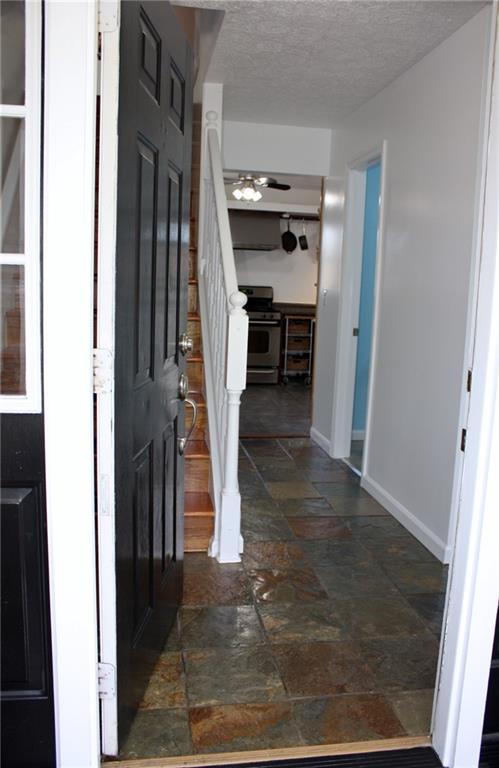 81 Bellview Circle McKees Rocks, PA 15136 - Photo 10 of 24 Stunning foyer and hallway with stone flooring