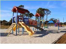32-167 Riverview Road Navarre, FL 32566 - Photo 6 of 11 a view of a park with swings and slides