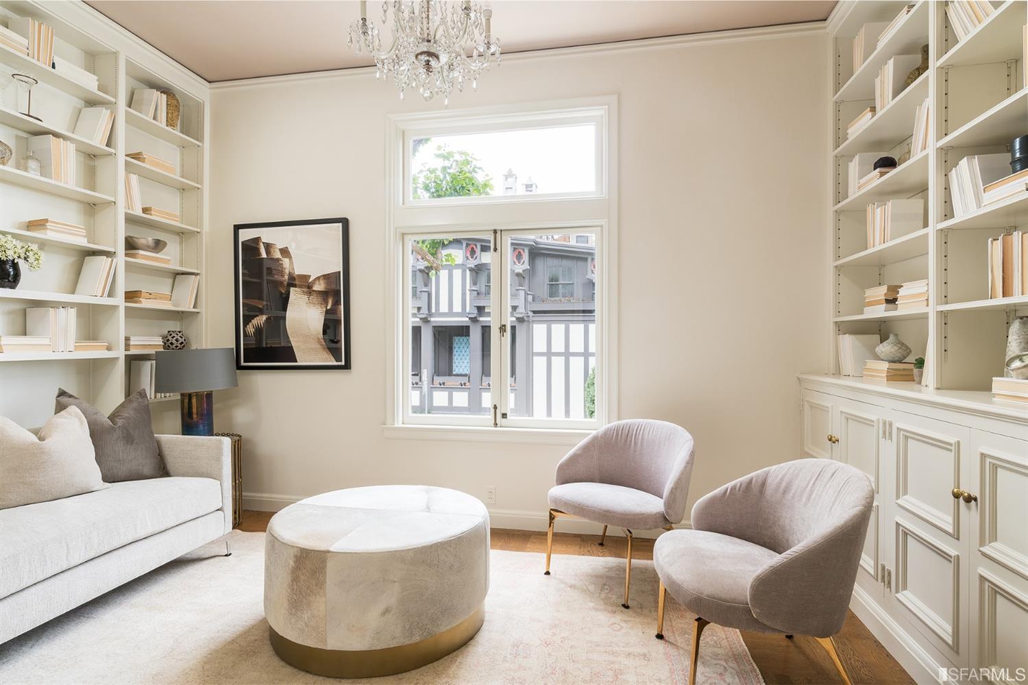 3498 Jackson Street San Francisco, CA 94118 - Photo 12 of 38 a living room with a table and a large window
