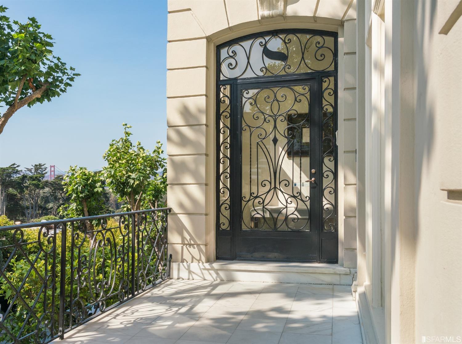 3498 Jackson Street San Francisco, CA 94118 - Photo 3 of 38 a view of a house with a yard and a large pool