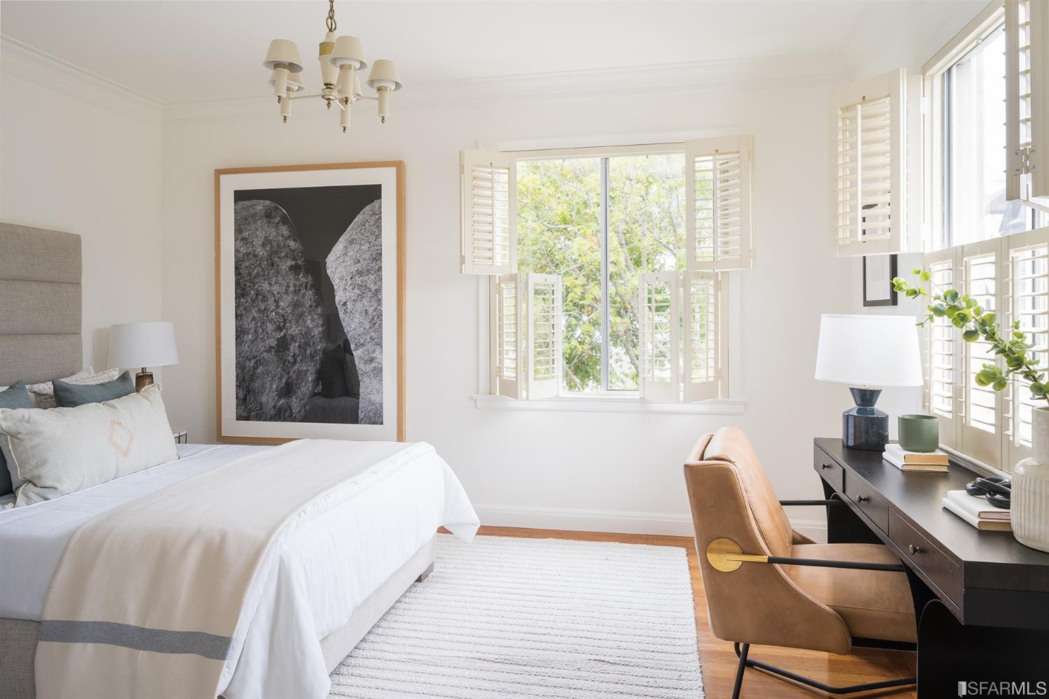 3498 Jackson Street San Francisco, CA 94118 - Photo 27 of 38 a view of a dining room with furniture a chandelier and a large window