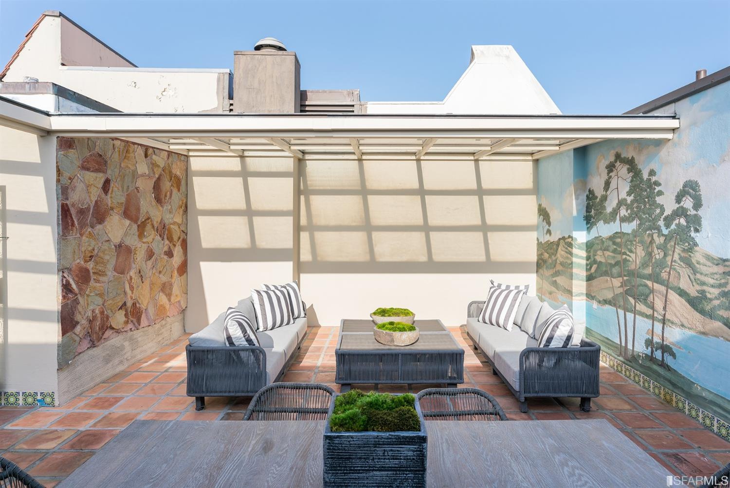 3498 Jackson Street San Francisco, CA 94118 - Photo 31 of 38 a view of a patio with chairs and a table